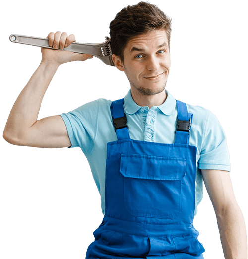 Image of a plumber holding a wrench and ready to work